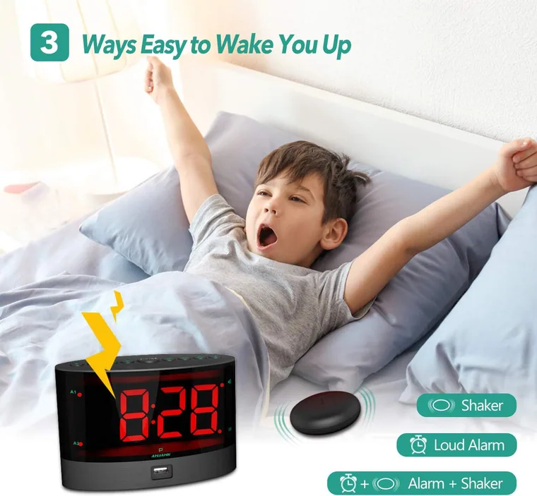 A child waking to the red bed shaker clock